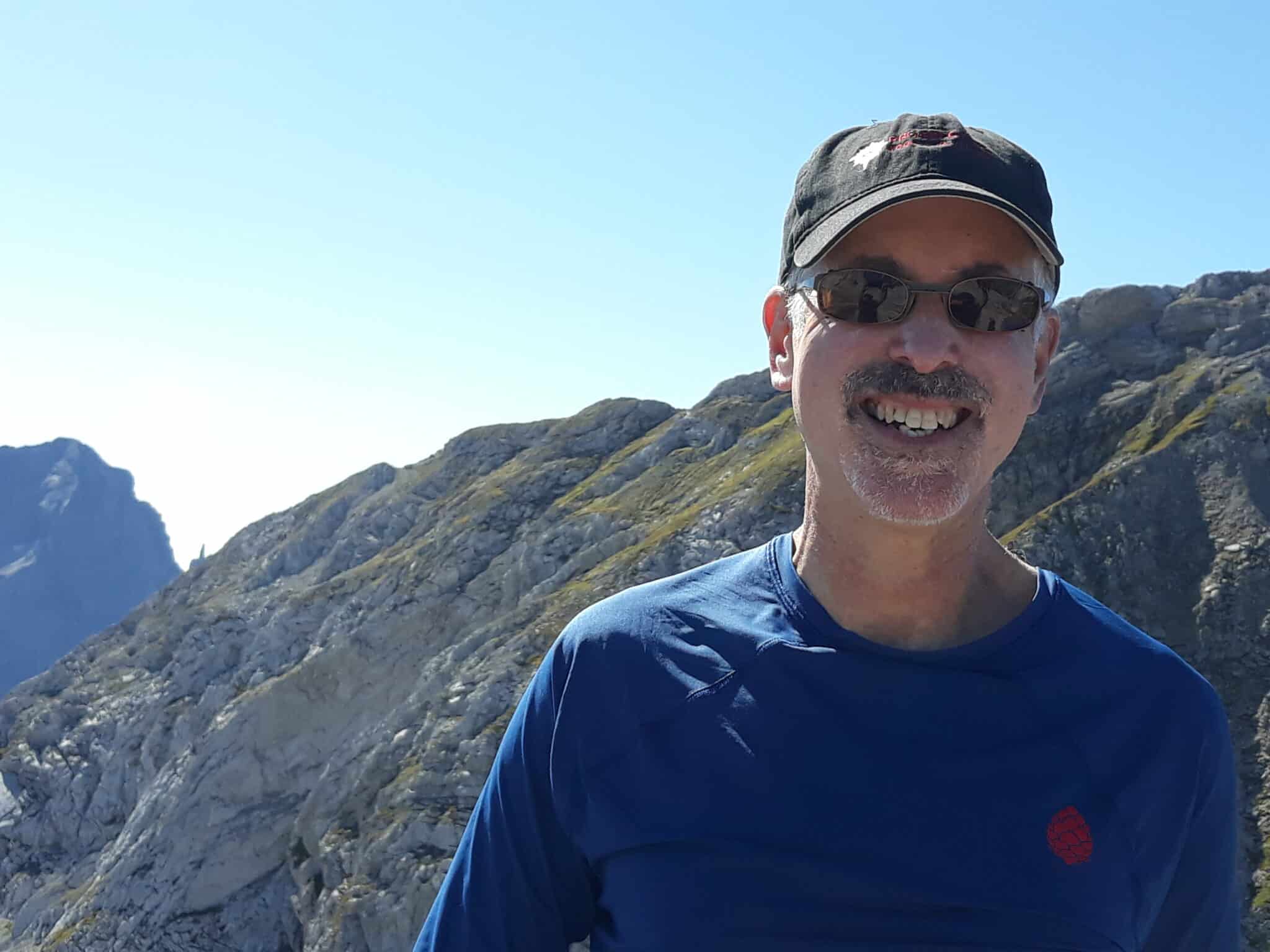 BearVault Adventure Ambassador Barry at the top of some mountains in New Hampshire.