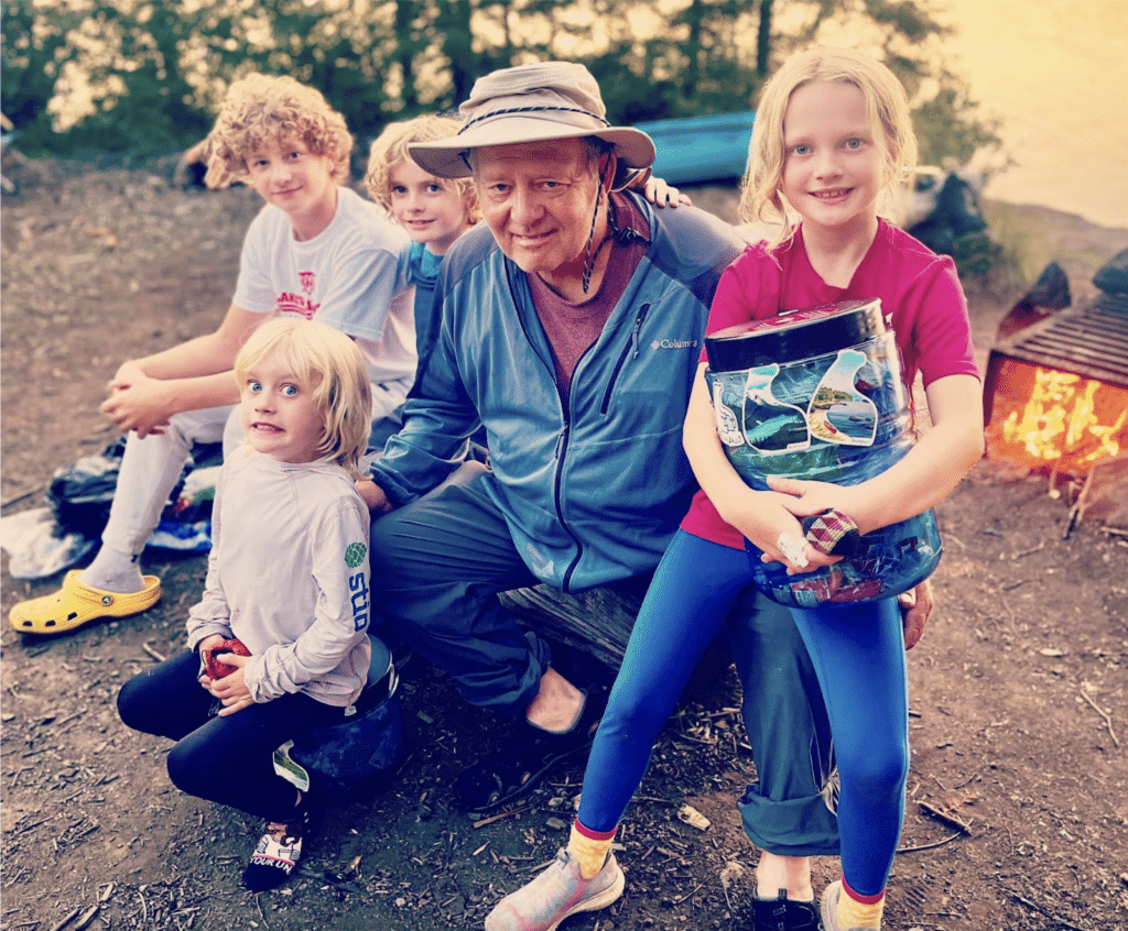 A whole family posed at a canoe camp with a BV500.