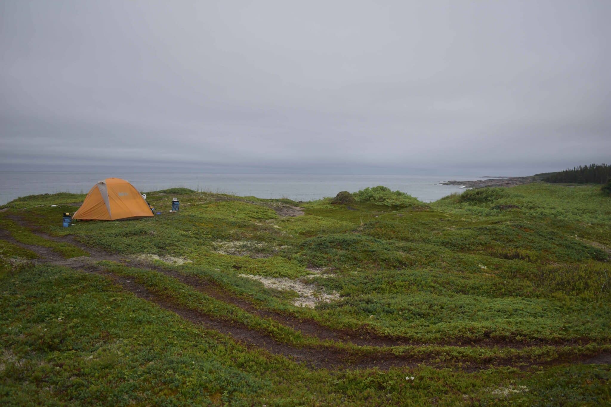The author's tent on the edge of the St Lawrence River, north shore, Quebec.